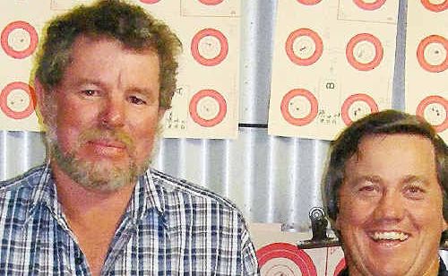 Warwick SSAA branch member Greg Roulston receives a life membership from branch president Mal Smith at a shoot at Risdon Range. Warwick SSAA branch member Greg Roulston receives a life membership from branch president Mal Smith at a shoot at Risdon Range.